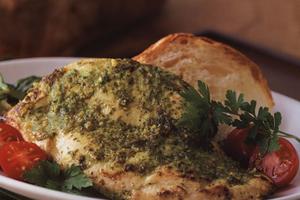 The pesto adds just the right flavor to the thin cutlets. (Noel Barnhurst/TCA)