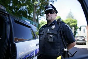 A police officer in Ipswich, Mass., wears a WatchGuard body camera on July 29, 2020. Jonathan Wiggs/The Boston Globe via Getty Images