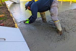 This concrete mason is doing an excellent job of placing and finishing the patio at my son’s house. No extra water was added to the concrete at the jobsite. (Tim Carter/Tribune Content Agency/TNS)