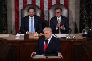 U.S. President Donald Trump, with Vice President JD Vance and Speaker of the House Mike Johnson (R-LA) looking on, delivers his State of the Union address during a Joint Session of Congress at the U.S. Capitol on Feb. 24, 2026, in Washington, D.C. Trump delivered his address days after the Supreme Court struck down the administration's tariff strategy and amid a U.S. military buildup in the Persian Gulf threatening Iran. (Andrew Harnik/Getty Images/TCA)