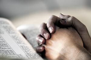Praying hands. Dreamstime/TCA
