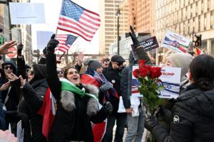 Robin Buckson/The Detroit News/TNS