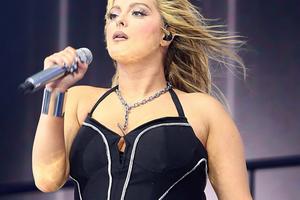 Bang Showbiz / Bebe Rexha feels happier than ever.