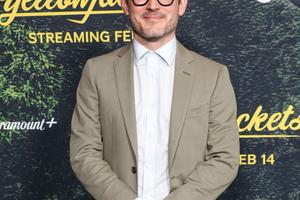 Bang Showbiz / Elijah Wood is reading Lord of the Rings.