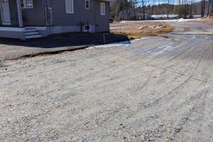 This is what a recycled asphalt driveway would look like, but just a little darker. Don't try pressure washing it! (Tim Carter/Tribune Content Agency/TNS)