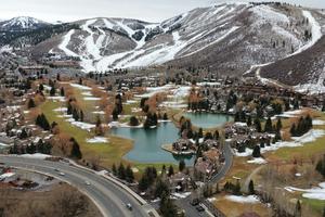 The snow drought was evident in Park City, Utah, on Feb. 9, 2026. This golf course is normally used for cross-country skiing in winter. Mario Tama/Getty Images