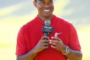 Bang Showbiz / Tiger Woods has been charged with DUI