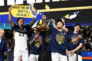 Robin Buckson/The Detroit News/TNS