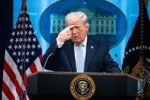 President Donald Trump mimics an Iranian protester being shot while holding a news conference in the White House on April 6, 2026. Tom Williams/CQ-Roll Call, Inc via Getty Images