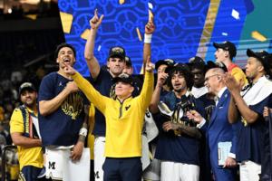 Robin Buckson/The Detroit News/TNS