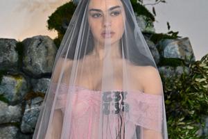 Bang Showbiz / Charli XCX plans to recycle her bridal looks.