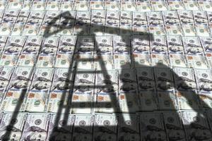 The oil industry is all about the Benjamins. Diy / iStock / Getty Images Plus