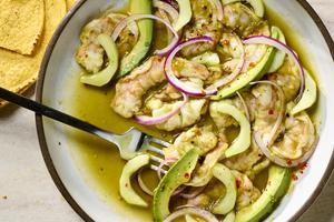 The spicy serrano-lime sauce is so good, you’ll want to drink it by the spoonful. (Alex Lepe/TCA)
