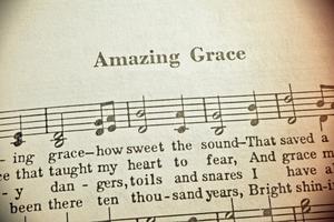 Amazing grace lyric. Dreamstime/TCA