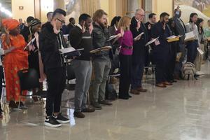 Dozens of immigrants from 18 nations take the oath to become U.S. citizens on Jan. 27, 2025, in Topeka, Kan.  AP Photo/John Hanna