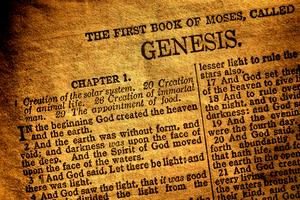 Antique Holy Bible Book Genesis chapter text. Dreamstime/TCA