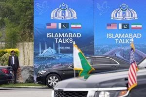 A Pakistani official is pictured during the arrival of the US Vice President JD Vance for US-Iran peace talks in Islamabad on April 11, 2026. US Vice President JD Vance arrived in Islamabad on April 11 for talks with Iran that the Pakistani premier hosting the warring sides called a 