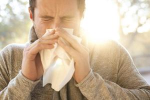 Sneezing, wheezing ... it's allergy season. Science Photo Library/Getty Images