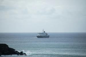 The cruise ship MV Hondius sits anchored off Praia, the capital of Cape Verde, on May 5, 2026, before setting course for Spain on May 6.   AFP via Getty Images