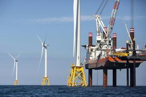 Wind farm construction means jobs and locally produced power. AP Photo/Michael Dwyer