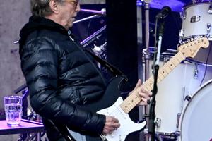 Bang Showbiz / Eric Clapton ended his Madrid concert early after a flying vinyl sleeve hit him in the chest onstage