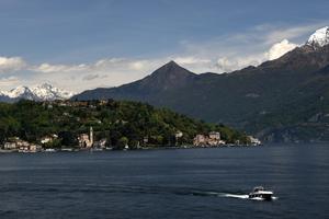 Lake Como is lined with luxurious villas, crowned by snow-capped mountains, and busy with fleets of little ferries darting from one cute town to another. (Cameron Hewitt, Rick Steves' Europe)
