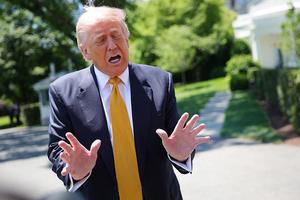WASHINGTON, DC - MAY 12: U.S. President Donald Trump speaks to the press as he departs the White House on May 12, 2026 in Washington, DC. Trump is traveling to China where he is scheduled to meet with Chinese President Xi Jinping for expected talks on the Iran conflict, trade imbalances, regional security, and economic cooperation between the two countries. (Photo by Kevin Dietsch/Getty Images)