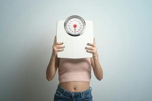 Each person's body has a different sweet spot for weight that it tries to maintain. Francesco Carta fotografo/Moment via Getty Images