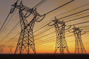 Transmission lines can carry power long distances, but the U.S. grids aren't all connected. imaginima/iStock/Getty Images Plus