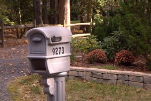 A good choice is a mailbox designed with a front and rear opening so it’s easy to open from either end. (Gene Hamilton/TCA)