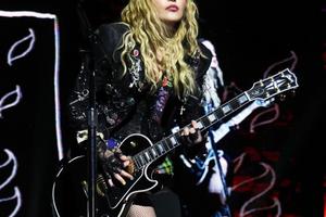Bang Showbiz / Madonna wants people to 'connect' through music
