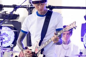 Bang Showbiz / MGK got sick while getting his blackout tattoo