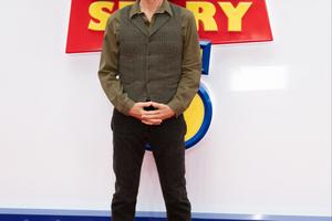 Bang Showbiz / Tom Hanks reveals when he and Toy Story 5 co-stars found out about Taylor Swift's soundtrack song