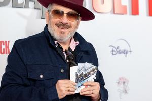 Bang Showbiz / Elvis Costello won't be suing Olivia Rodrigo over her track Brutal