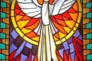 Holy Spirit, stained glass, church window. Dreamstime/TCA