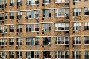Many U.S. apartments have individual heating and cooling systems that are less efficient than current technology. Spencer Platt/Getty Images