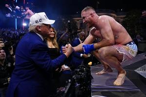 Justin Gaethje shakes hands with President Donald Trump after winning the UFC lightweight title fight at the White House on June 14, 2026. Chris Unger Zuffa LLC/Getty Images
