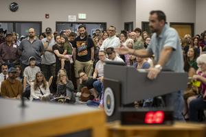 Citizens attend a City Council hearing in Pocatello, Idaho, to discuss the prospect of a new $2.6 billion data center in their community.  Natalie Behring/Getty Images