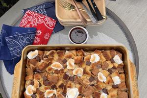 Toasted marshmallows, melty chocolate and crunchy graham crackers make this bread pudding a festive summer favorite. (JeanMarie Brownson/TCA)