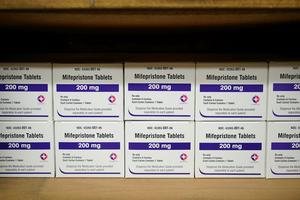 Boxes of the drug mifepristone line a shelf at a women's center in Alabama on March 16, 2022. AP Photo/Allen G. Breed
