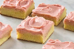 Strawberry frosting that is fruity and sweet is the perfect partner for tangy sour cream cookie bars. (Alex Lepe/TCA)