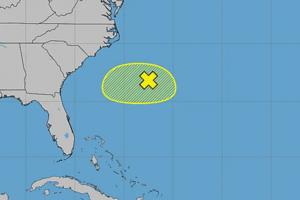 Handout/National Hurricane Center/TNS