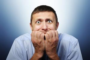 Fearful man. Dreamstime/TCA