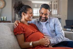 Couple expecting a baby. Dreamstime/TCA