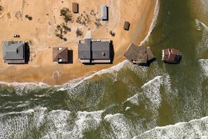 Sea-level rise changes coastlines, putting homes at risk, as Summer Haven, Fla., has seen. Aerial Views/E+/Getty Images