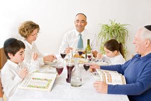 Jewish family celebrating passover. Jewish family in seder celebrating passover. Dreamstime/TCA