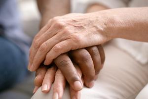 Talking about the dying process early can be supportive for caregivers and their loved ones. AlexanderFord/E+ via Getty Images