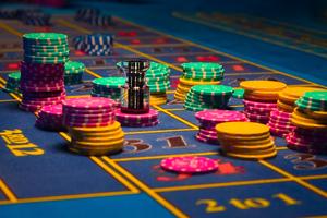 Gambling chips on table. Dreamstime/TCA