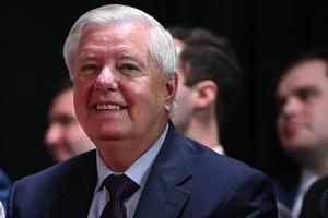 U.S. Senator Lindsey Graham, Republican of South Carolina, listens to President Donald Trump unveiling the Kennedy Center Honors nominees on Aug. 13, 2025, at the Kennedy Center in Washington, D.C. (Mandel Ngan/AFP via Getty Images/TCA)