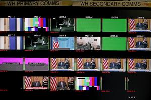 Screens in the James S. Brady Press Briefing Room show President Donald Trump delivering a primetime address on July 16, 2026, during which the White House unveiled a collection of declassified documents. Alex Wong/Getty Images